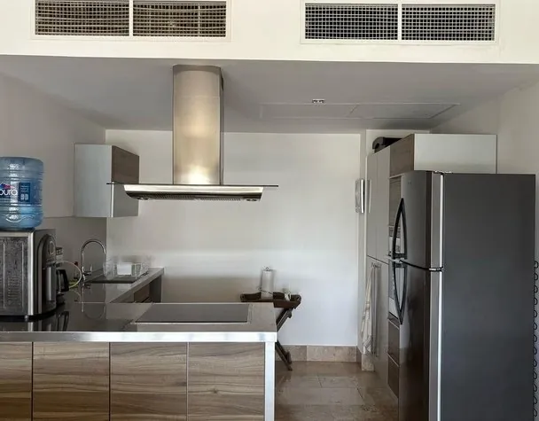 Cocina gourmet con electrodomésticos premium del Penthouse 07M en La Amada, Cancún