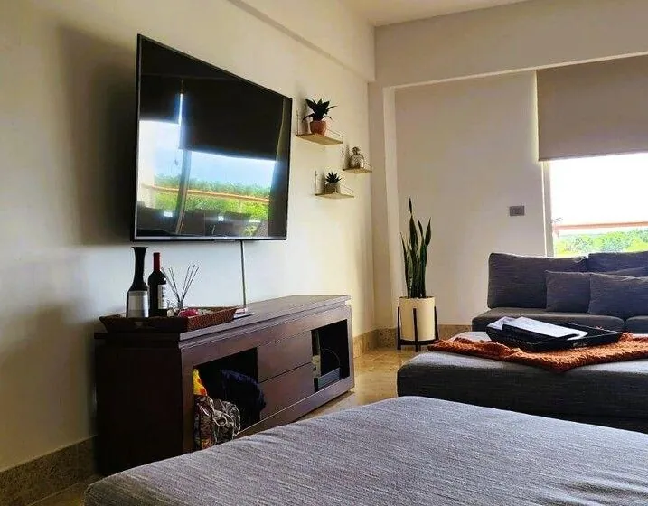 Sala de TV en recámara del Departamento 305L en La Amada, Costa Mujeres, Cancún